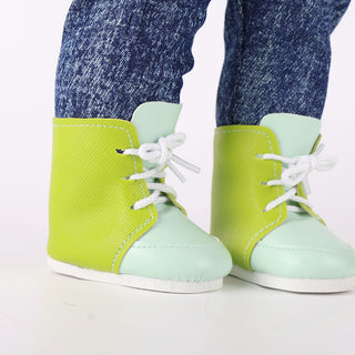 Detail close-up of Anna doll's detachable sneakers, showing ankle and sole design for versatile styling.