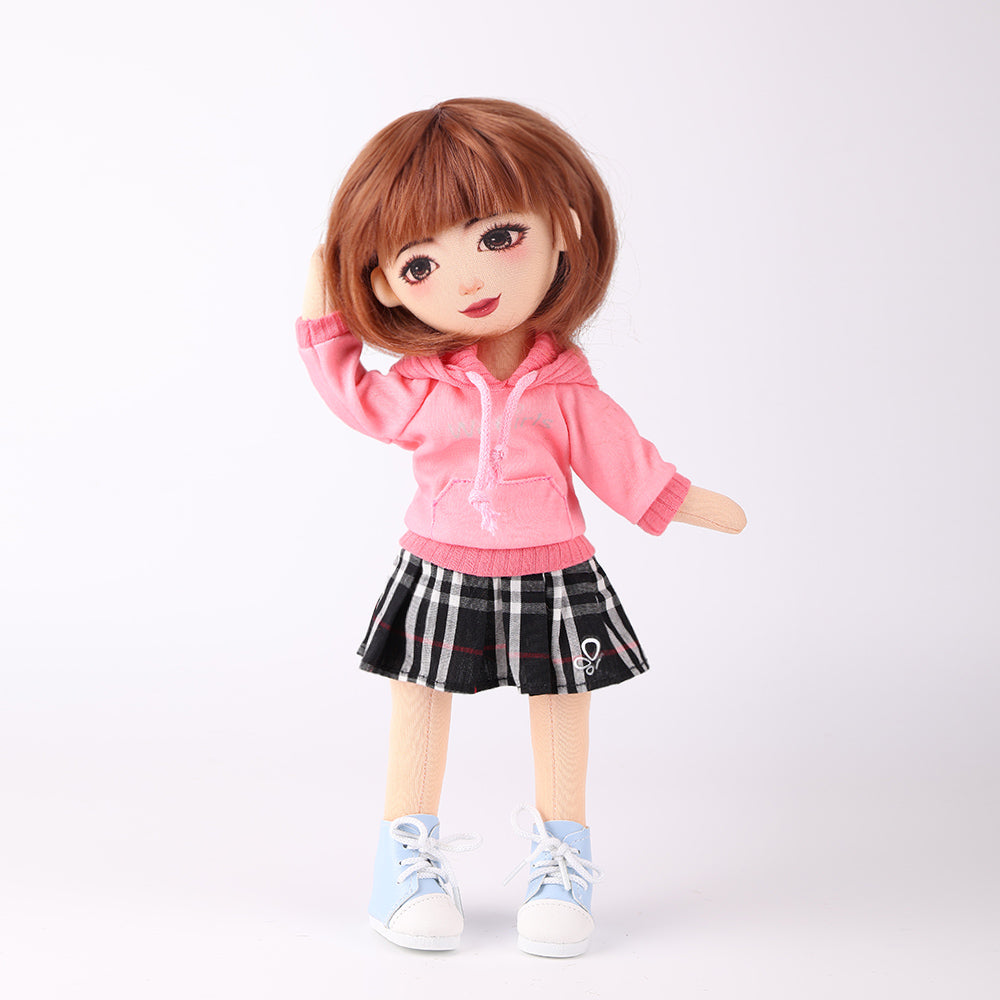 WeGirls Akiko cotton doll wearing pink hoodie and houndstooth pleated skirt - full front view
