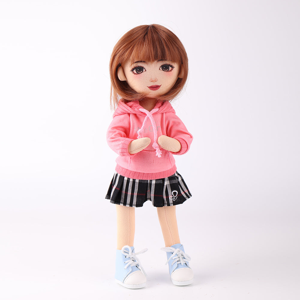 Akiko doll in clapping pose - showing joint flexibility and play action