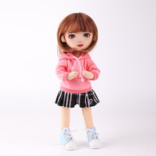 Akiko doll in clapping pose - showing joint flexibility and play action
