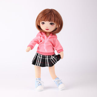 Akiko doll holding her houndstooth pleated skirt playfully - cute interactive pose
