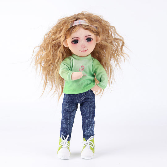 WeGirls Anna doll in teal T-shirt and blue jeans with hands casually in pockets - playful pose