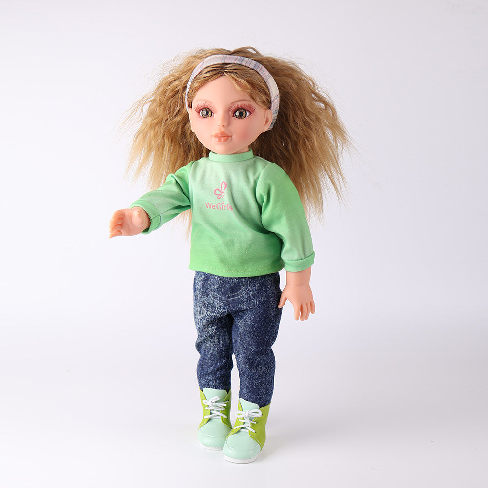 Front view of WeGirls Artist Anna doll with blonde curls, wearing a teal t-shirt and blue jeans, ready for creative play.
