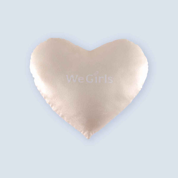 Detail of the heart shape pillow design showing full curves