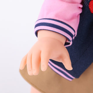 Close-up of Lucy doll's articulated plastic hands with realistic shaping