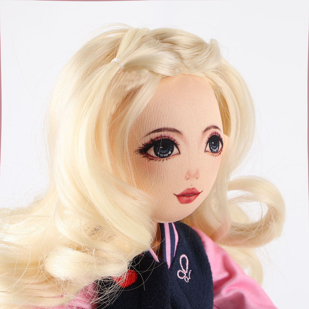 Close-up of Lucy doll's blonde hair and expressive facial features