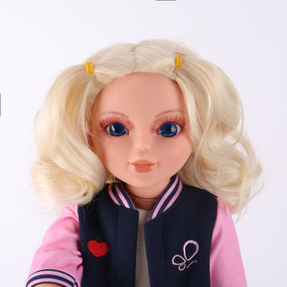 Front portrait of Lucy doll showcasing realistic facial features and handmade eyelashes