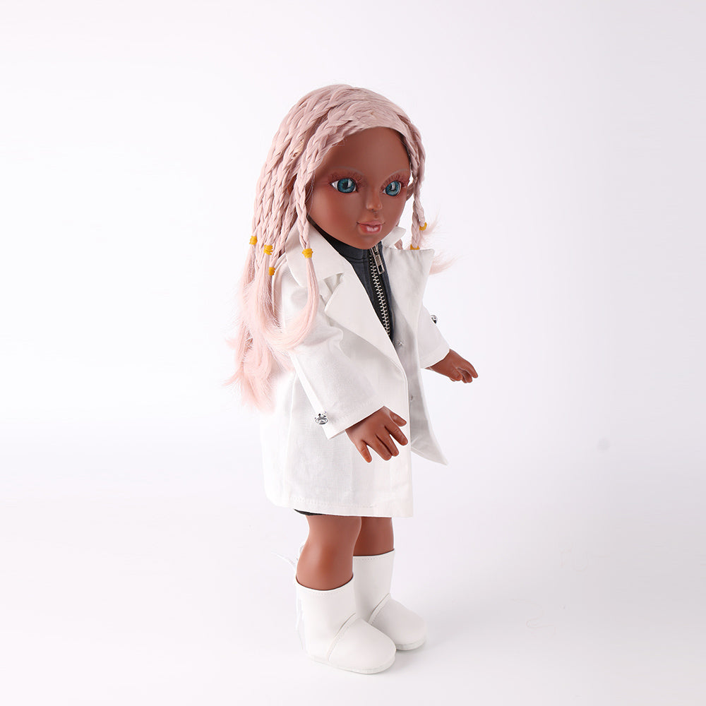 Side profile of the Naya doll showing the premium cotton body, flexible plastic joints, and detailed pink braided hair.