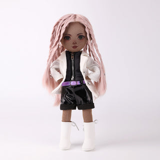 Naya doll in confident pose with hands on hips, showing pink braided hair style