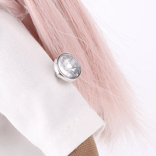 Close-up view of decorative embellishments on Naya doll's jacket sleeves